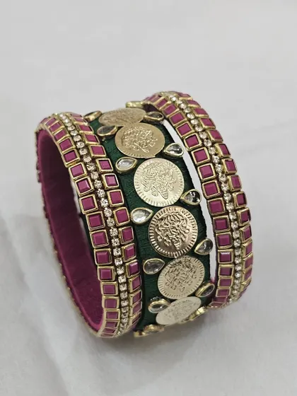 The beautiful green and pink silk thread bangle set, perfect for a bride.