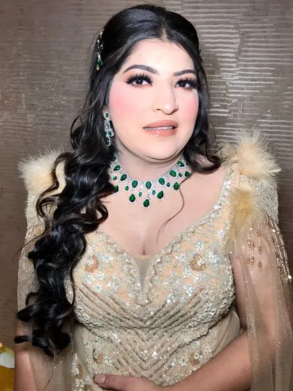 Another close-up of the glamorous makeup and jewelry.