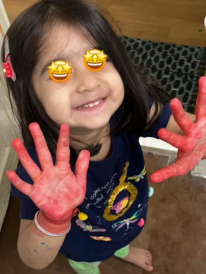 Messy hands mean a happy, creative heart! This little one is having a blast with finger painting, a perfect sensory art activity for my youngest scientists.