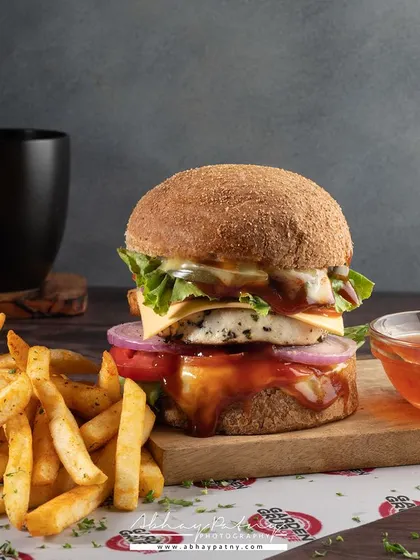 This image explains my philosophy: photography is both art and science. I carefully composed this shot to balance the colors and textures, leading the viewer's eye straight to the hero burger.