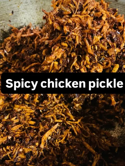 A fresh batch of my spicy shredded chicken pickle is available. It's a versatile condiment that adds a fiery kick to any dish.