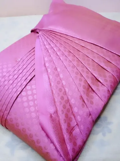 This bridesmaid's saree is pleated and ready. I ensure that everyone in the bridal party can have a perfect, hassle-free drape.