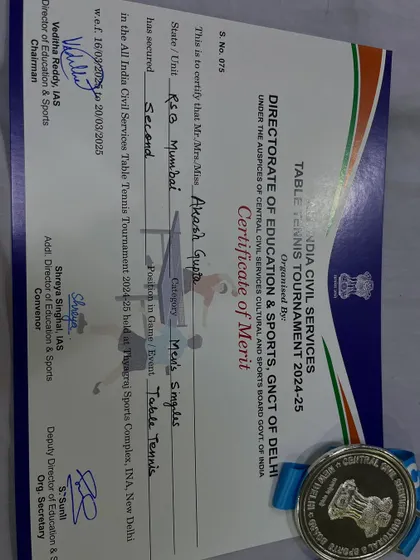 Our coach Akash Gupta on the podium after securing the runner-up position in the Men’s Singles at the All India Civil Services Table Tennis Tournament 2024-25.