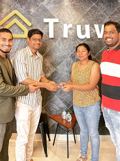 Handing over the keys is a milestone moment. Here I am with Sagarika and her family, celebrating their new home with our on-spot booking offer.