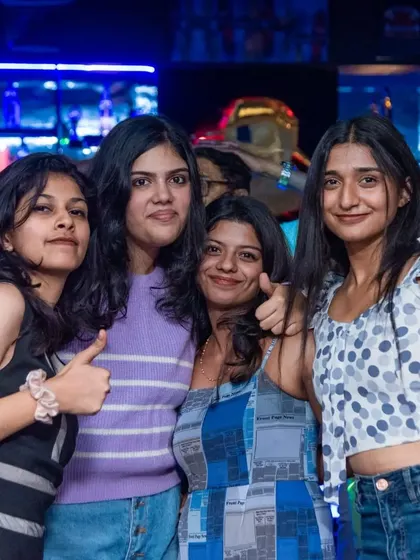 Thumbs up from a group of friends having a great time. Happy guests are my top priority.