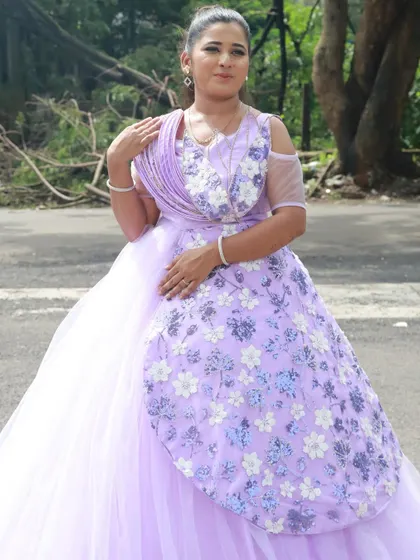 An elegant lavender gown paired with soft, romantic makeup. This is a perfect example of the event-ready looks our students learn to create.