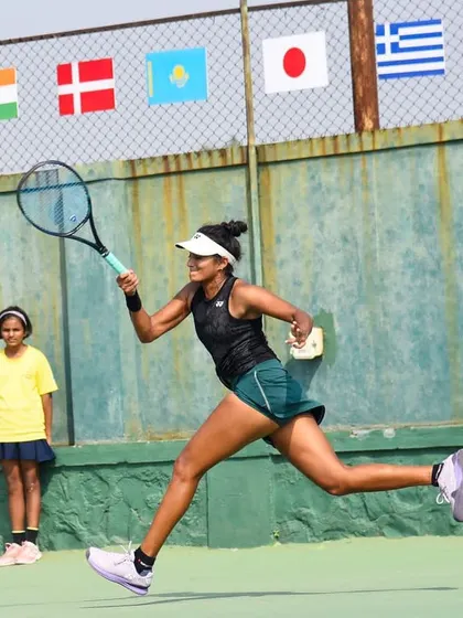 In action during the final of the ITF W25 Solapur. These photos show different aspects of my game under pressure, from hitting a running forehand to maintaining balance on a two-handed backhand.
