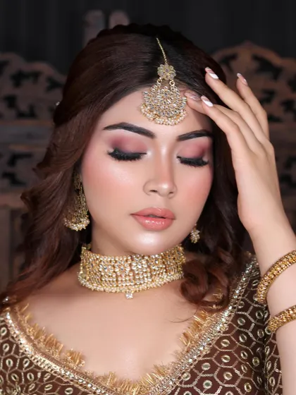 A close-up on the soft and dreamy eye makeup, proving that subtlety can be just as stunning for an engagement look.