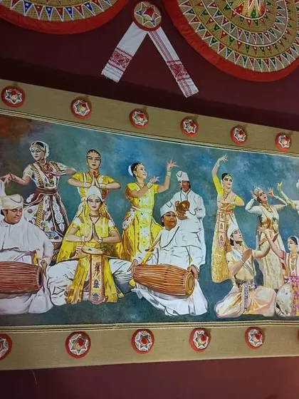 A close-up of one of the large paintings I created for the pandal, depicting traditional Assamese Bihu dancers and musicians.