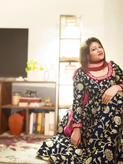 This is me, Mukulika, in one of my own creations. My journey as a designer is filled with beautiful memories, and I pour that same passion and love into every single outfit I create for you.