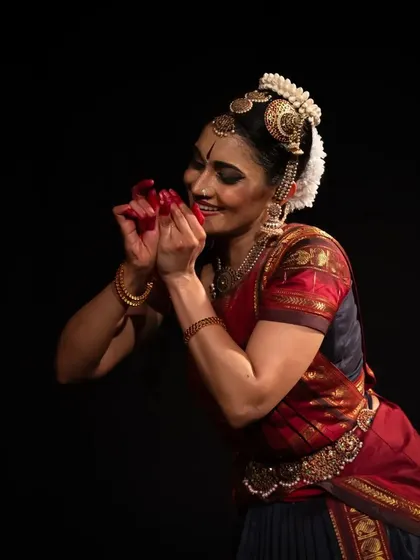 A close-up of a tender moment of abhinaya, full of grace and feeling.
