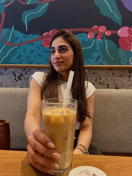 Offering you a sip of my coffee. It’s all about sharing the good things in life.