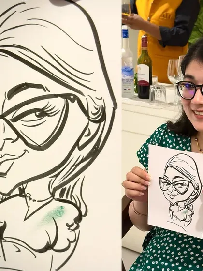 A guest at an event happily shows off her new black and white ink caricature. I focus on clean lines and expressive features to make each portrait pop.