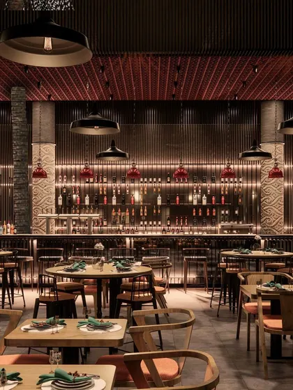 This concept image illustrates the overall mood we aimed for in the dining area. The render shows the interplay of warm lighting, wooden furniture, and the dramatic backdrop of the bar, which we successfully translated into the final space.