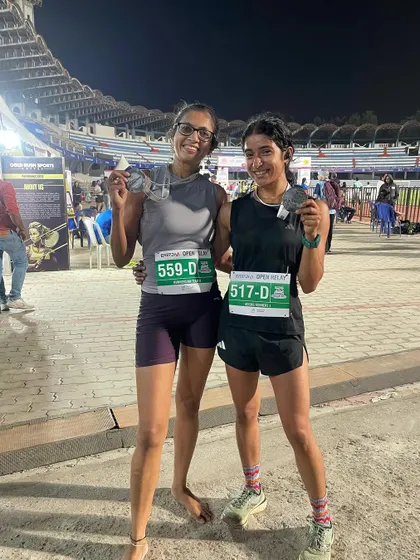 Finishing a midnight stadium relay run with a teammate. Events like these test your endurance and teamwork, and it is always a great feeling to cross the line with a medal.