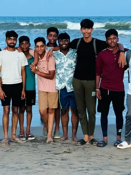 The team enjoys some downtime at a beach in Chennai, a great team-bonding experience during the tour.