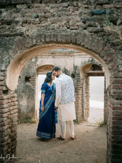 Framed by history. The archways of this ancient site in Satara create a beautiful, natural frame for this intimate moment between Ankush and Aishwarya during their pre-wedding shoot.