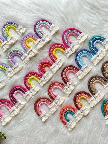 So many rainbows! This image shows the wide variety of color palettes I can create for my rainbow car charms and mini wall hangings.