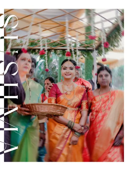 The bride's joyful entrance, surrounded by family. The creative motion blur adds a dynamic and artistic feel to this traditional moment.