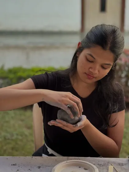 A moment of calm concentration. It's incredible to watch how the process of pinching and shaping clay can be so meditative and grounding, especially for those in high-stress professions.