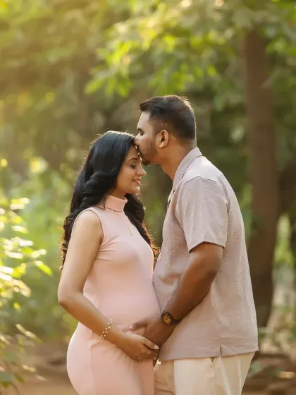 A tender kiss on the forehead is a classic for a reason. It's a simple, beautiful gesture of love, made even more magical by the soft outdoor light.