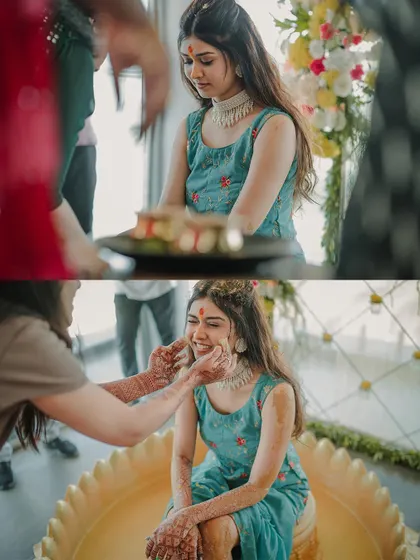 The bride's serene and happy moments as her family applies turmeric during the Haldi ritual. We capture the blend of tradition and personal emotion.