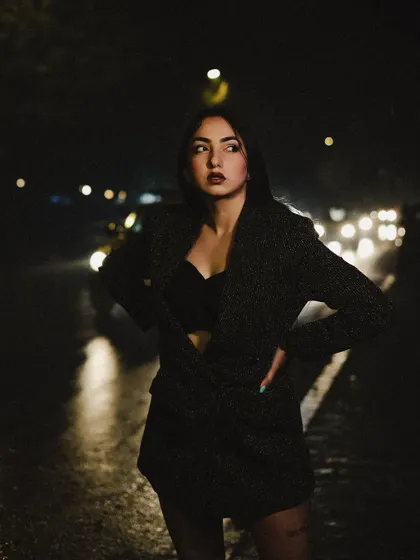 All black for the ones that lost me. A powerful night portrait on the street with beautiful bokeh from the car lights, shot by Eezome Productions.