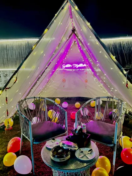 Our "Better Together" tent is a favorite for couples. It's a private, fairy-lit space on the lawn, perfect for celebrating your bond.