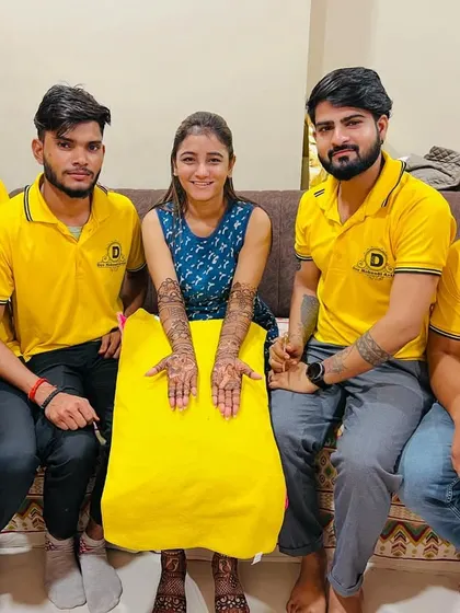 A group photo with a client and my team of dedicated artists.