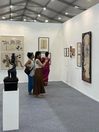 A view of our Art Mumbai booth, showing visitors interacting with various artworks.