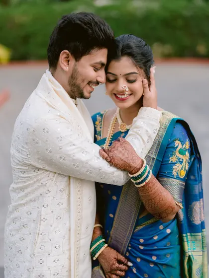 A tender and intimate close-up portrait of Tanuja and Abhishek.