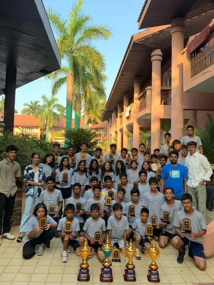 The entire Vikings squad, boys and girls, posing with a massive collection of trophies from our successful Goa tour. This picture is a powerful statement of our academy's collective achievement and dominance.
