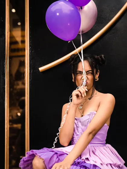 A playful and cheeky moment from the purple dress shoot. I don't take myself too seriously.