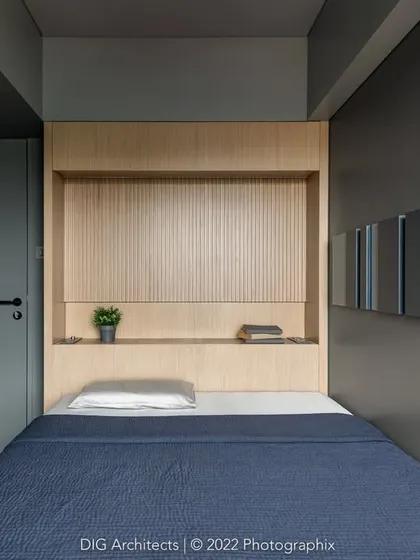 A slightly different angle of the third bedroom, emphasizing its minimalist and highly functional design.