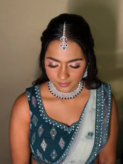 A close-up of the eye makeup. I used rosy hues and a touch of sparkle to create a look that is both romantic and glamorous, perfect for an evening event.