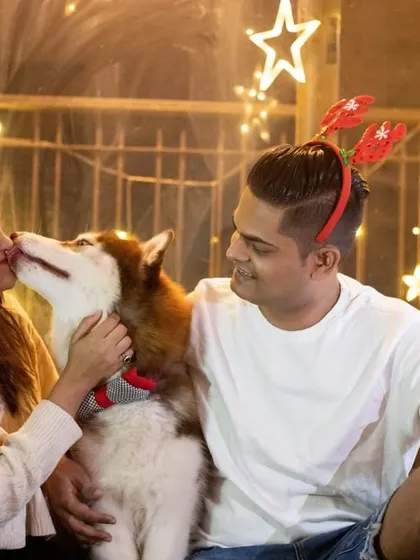 A sweet Christmas kiss for Walt the Husky from his mom. My at-home sessions allow me to capture intimate family moments in a comfortable and familiar setting.