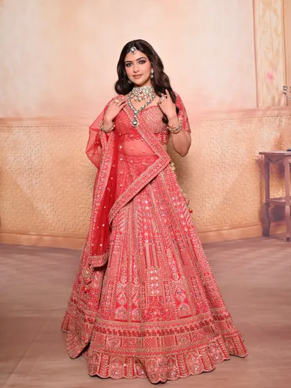 A full-length shot showing the entire bridal ensemble, proving that the makeup stands out beautifully even from a distance.