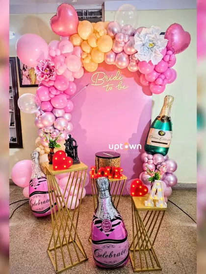 A complete view of the pink-themed bridal shower decor.