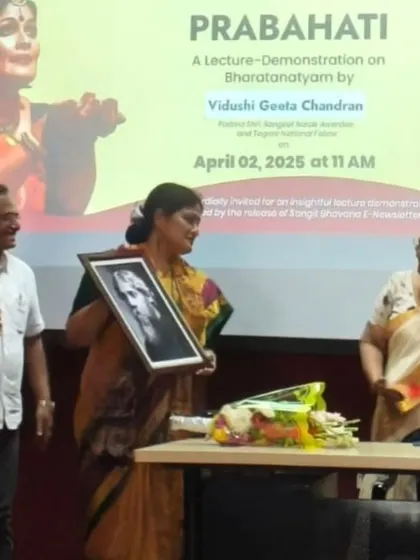 Receiving a portrait of Rabindranath Tagore at the conclusion of my lec-dem at Shantiniketan.