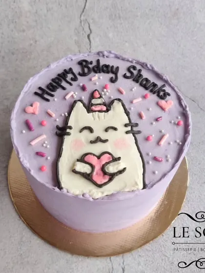 This Pusheen-inspired cake was another fun client collaboration. The half-kg Chocolate Truffle cake features a cute, hand-piped Pusheenicorn on a lovely lavender background.