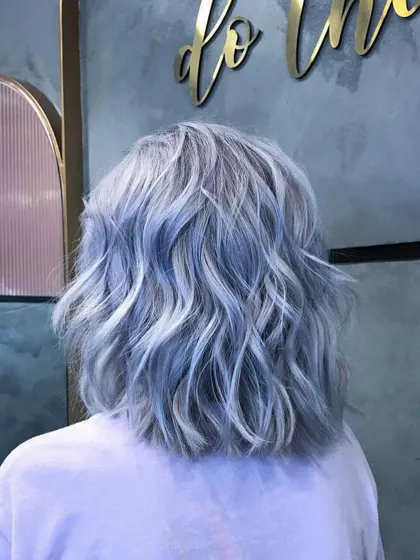 Another angle of the ash-blue hair, showing how the light reflects off the metallic tones to create a stunning, multi-faceted look.