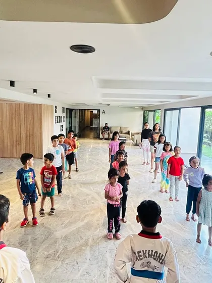 A wide shot of our class, showing students of all ages learning together.