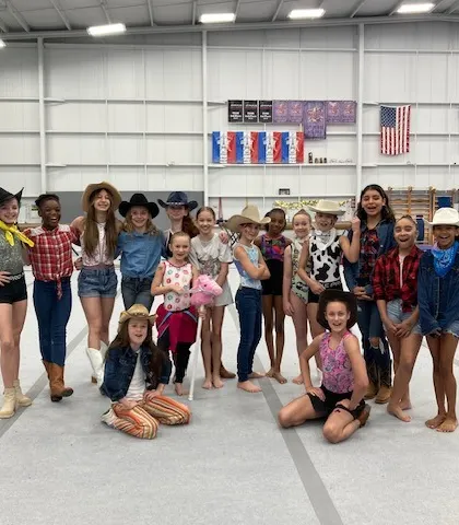 Our Women's Development group having a blast during Rodeo Day. We believe that team spirit and fun are just as important as training.
