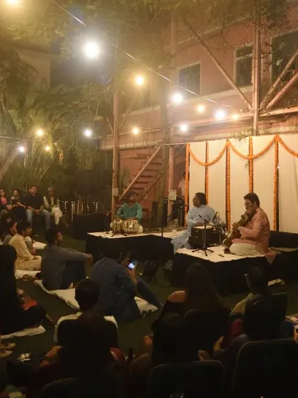 A view of the audience at The Courtyard, completely absorbed in the music under the evening lights. This is the connection I strive for in every performance.