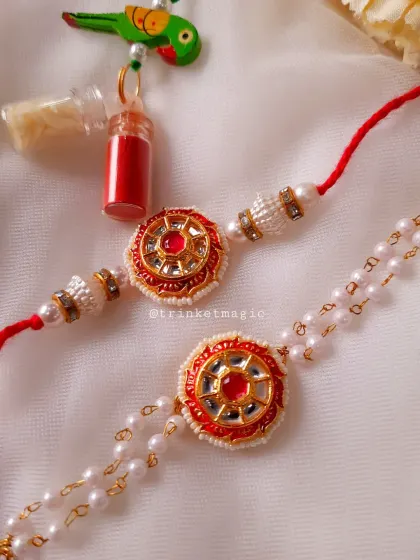 A closer look at one of my traditional Kundan Bhai Bhabhi sets. The intricate mirror work and red stone are set on a classic red thread for him and a delicate pearl chain for her.