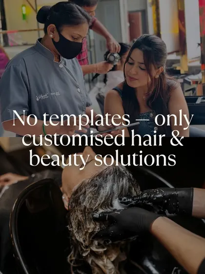 We offer no templates, only customized hair and beauty solutions. This image shows our stylists in consultation with clients, tailoring services to their needs.