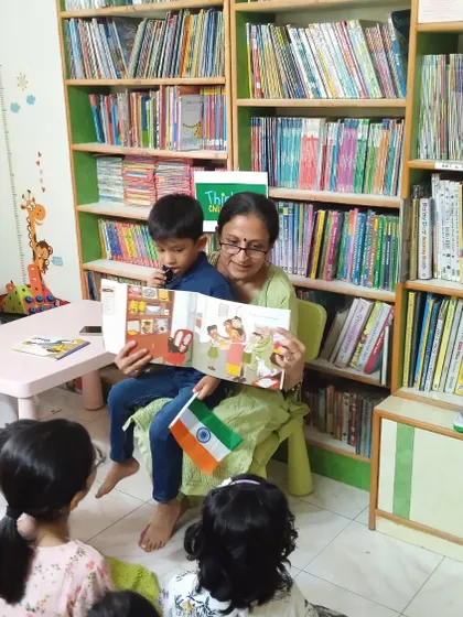 This is what our library is all about. A quiet moment, a captivating book, and the simple joy of reading together. I cherish these times, watching the next generation of readers, dreamers, and thinkers begin their journey with stories.