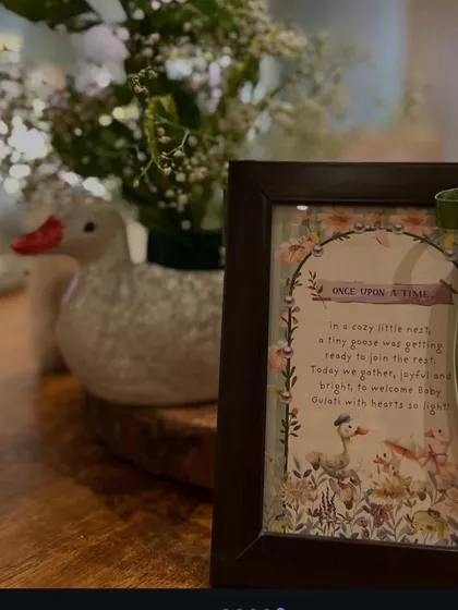 A personalized, framed poem for the baby shower, a thoughtful detail that adds a touch of sweetness and sentiment to the decor.