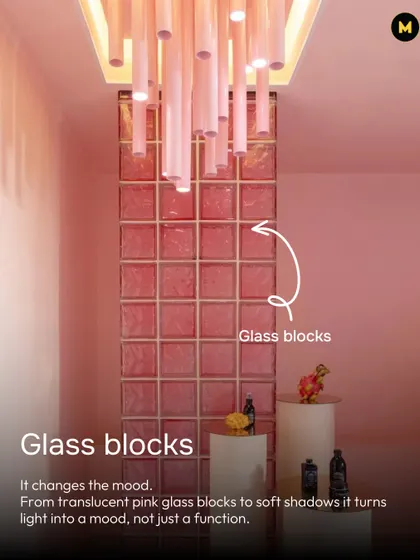 Pink can change the mood. These translucent pink glass blocks turn light into a mood, not just a function, casting soft shadows and adding a unique architectural element.