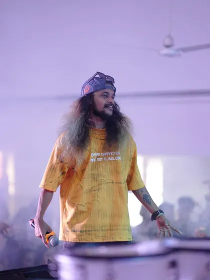 A candid shot of me on stage, interacting with the student audience.
